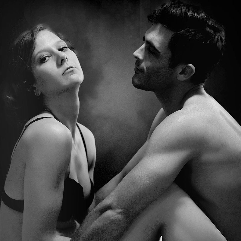 She moved closer, her hand gliding along with a deliberate and intimate touch, her actions stirring an overwhelming rush of sensation within him.